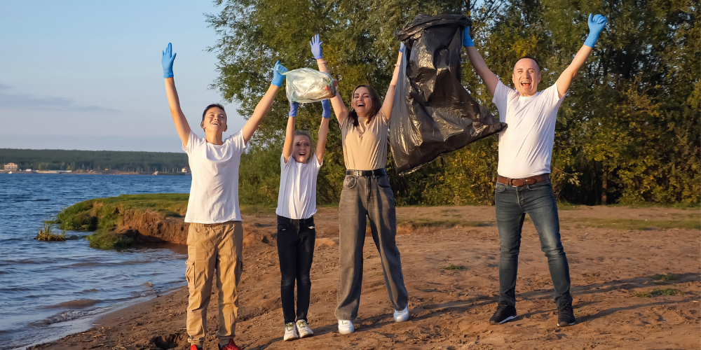 family cleaning a beach